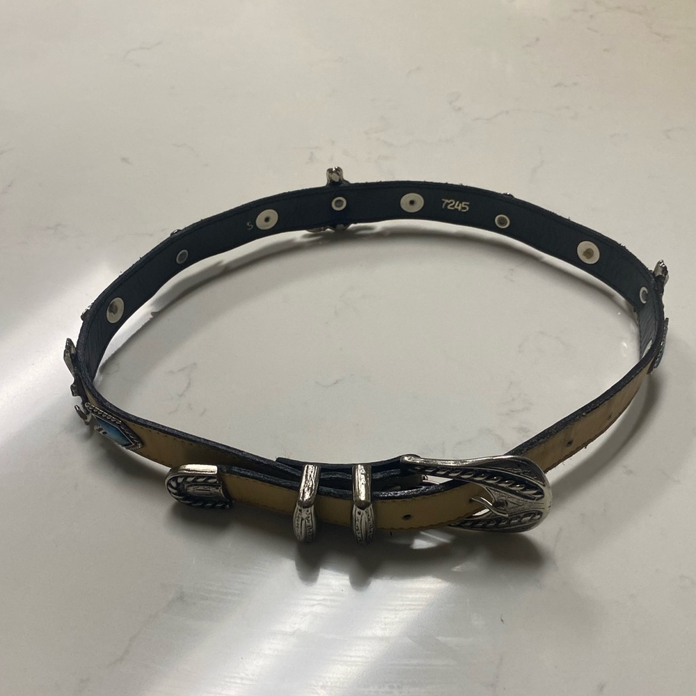 Western-style longhorn cow skull concho leather belt
Black and Tan Leather